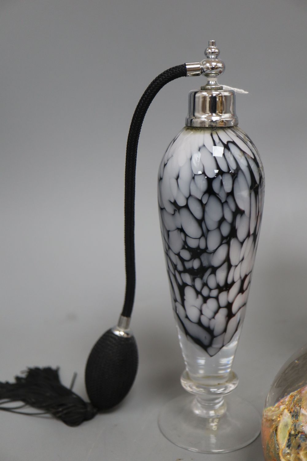 An Art Deco decanter, height 27cm, two glasses, a glass paper weight and a scent bottle